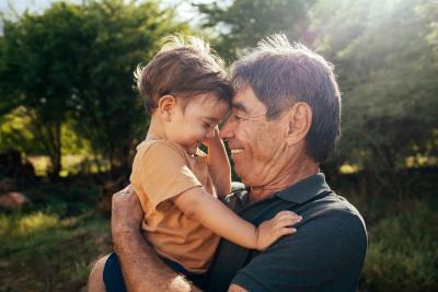 Man holding and hugging child