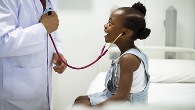 young girl with doctor