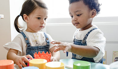 children playing with cups