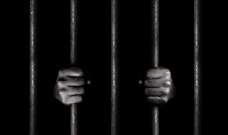 hand through fence