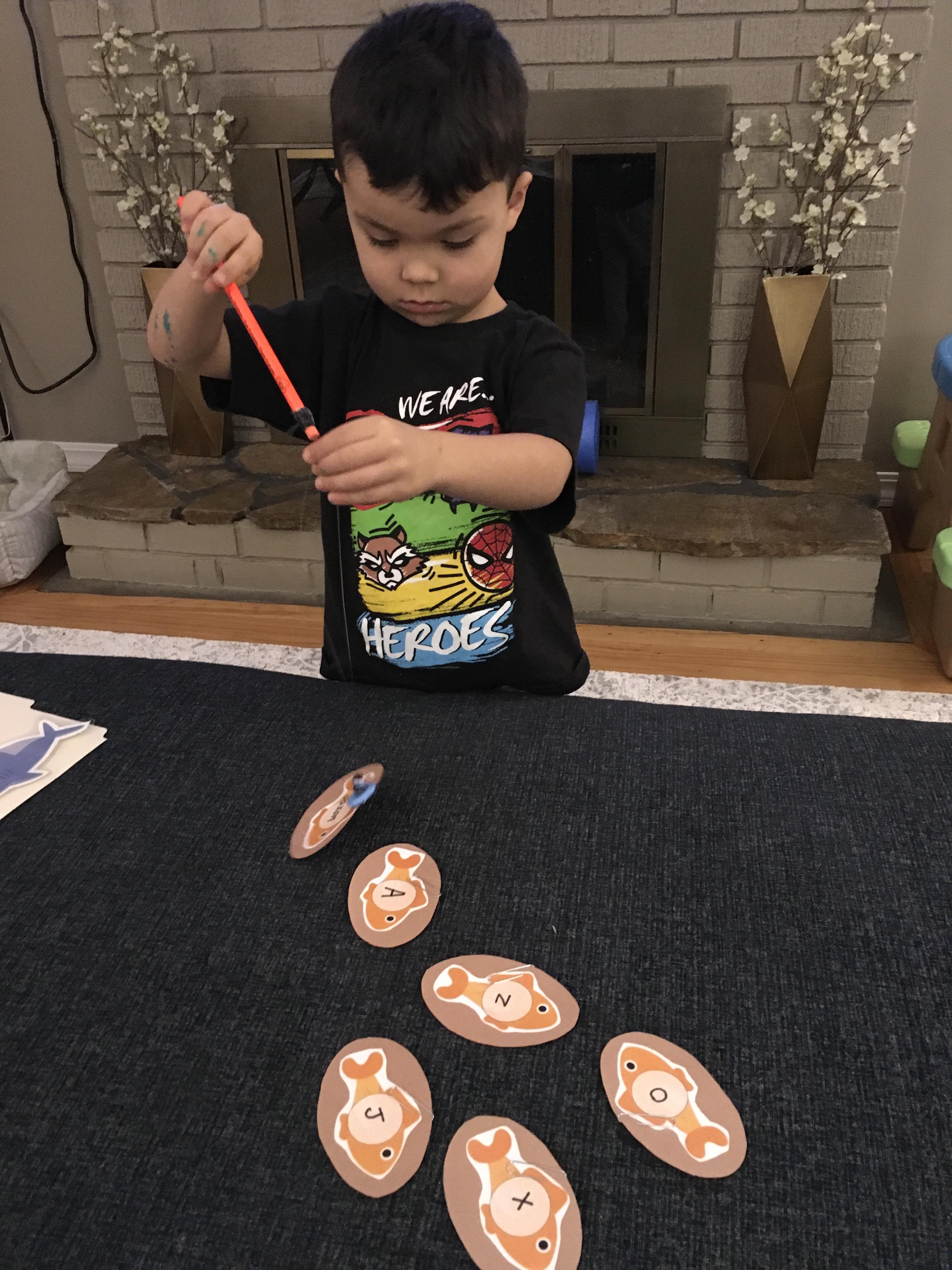 Jaxon doing an activity at home