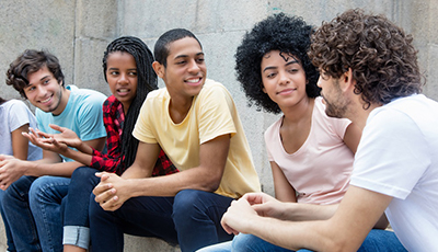 teens sitting outside