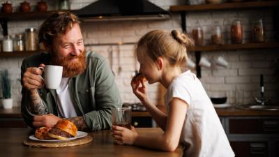 Father and child eating