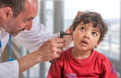 Dr. with stethoscope and child