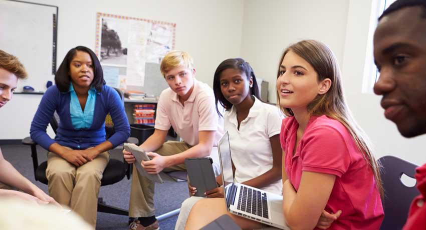 group of teens having discussion