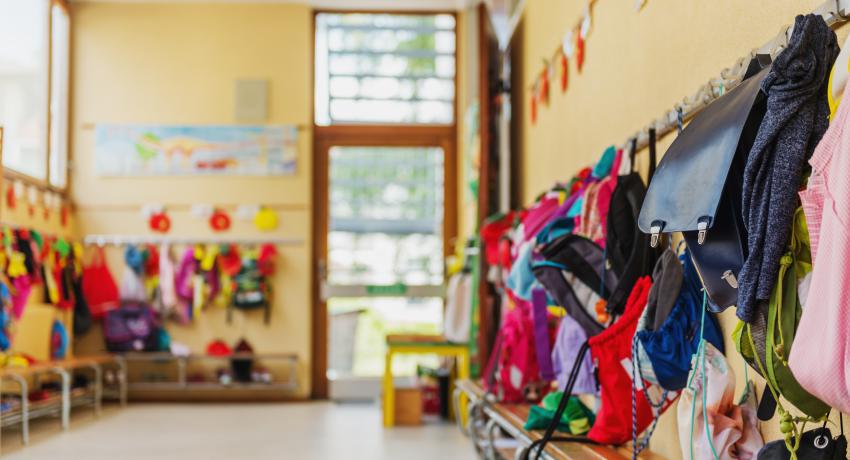 Photo of backpacks in a child care center