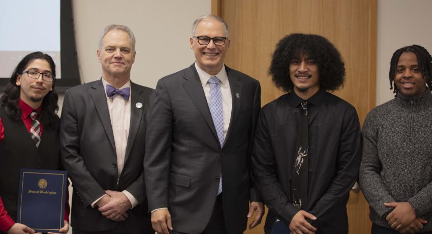 Governor Inslee and Ross Hunter with three young men