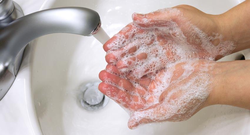 child washing hands