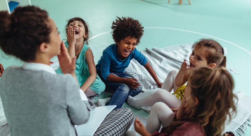 A group of diverse children in a child care environment.