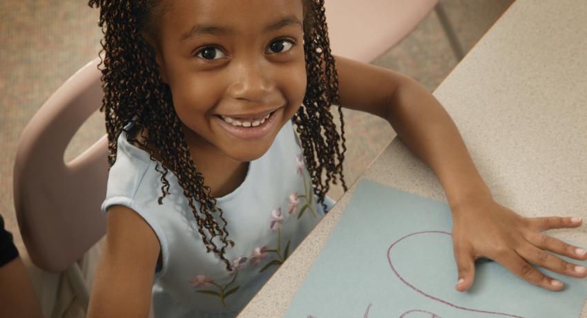 Child drawing in child care environment