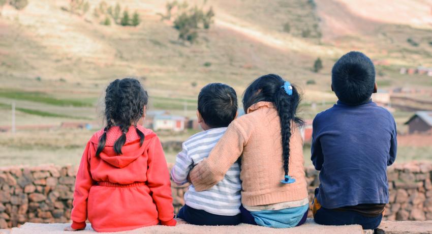 Indigenous children sitting together